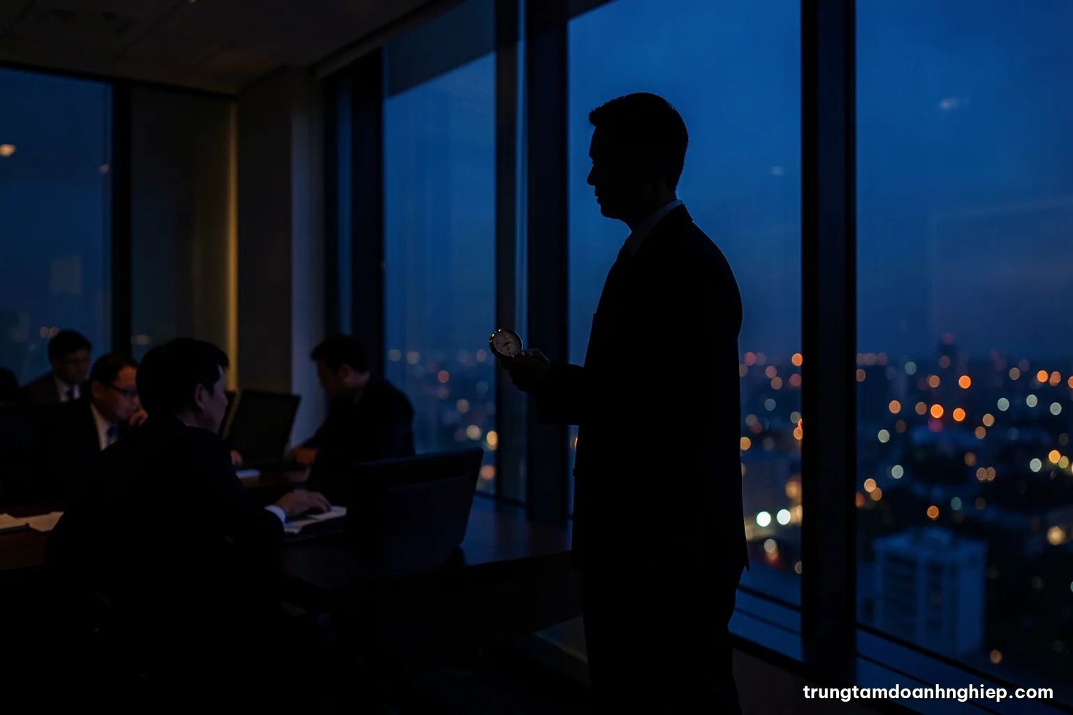 Silhouette of a Vietnamese engineer standing by a tall window at dusk holding a stopwatch, city lights blurred below, long shadows, deep blue and copper palette